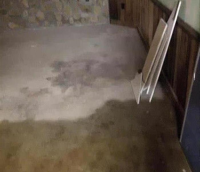 A picture of a basement that has had flooding.