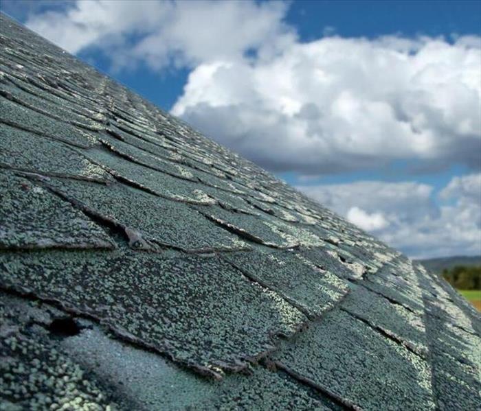 A picture of a roof with hail damage.